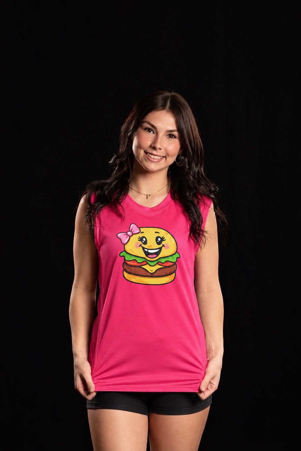 Peyton Reynolds wearing a pink Burger Girlz uniform in a studio portrait